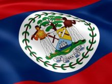 stock footage belizean flag in the wind part of a series